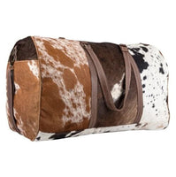 These cowhide duffel bags feature two handles as well as an adjustable shoulder strap so you can carry it in whichever way suits your needs best. 