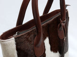 Plus, with so many colors and textures available, it's easy to find a unique design in cowhide tote bag that expresses your personal sense of style.