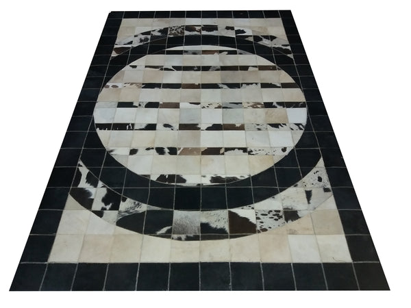 Black cowhide patchwork rug