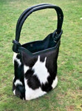  This cowhide purse is delightful, so well made and it feel like it will last forever, use it daily and it will suit ones need perfectly, pleasing quality and fast shipping