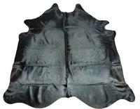 Black Cowhide rugs are a popular choice for home decor, as they provide a natural and rustic look to any room. Additionally, cowhide rugs are known for their durability and longevity, making them a wise investment for your home. If you're looking to add a touch of industrial design to your home, consider using a cowhide rug as your main piece of decor.