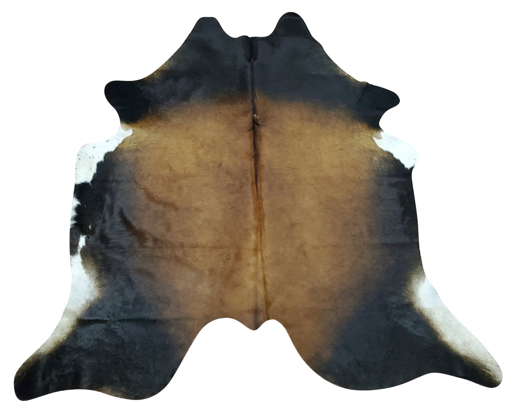A vibrant cowhide rug in a mix of brown and tricolor, add as runner for your kitchen, natural and real with soft patterns, free shipping USA