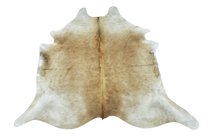 This taupe palomino cowhide rug is fabulous and super soft, you will like rolling yourself in it and escape this world, it is natural and genuine. 