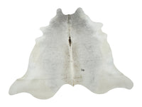 Grey tan authentic cowhide rug is rare to find and a stunning accent for the modern home, we have shades ranging from tan to unique brindle cowhides.