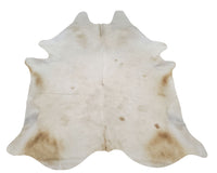 Beige And White Cowhide Rug