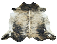 Exactly as pictured this Brazilian grey tricolor cowhide rug in an exotic brindle pattern will please all your friends and family, to add it as a gift. 