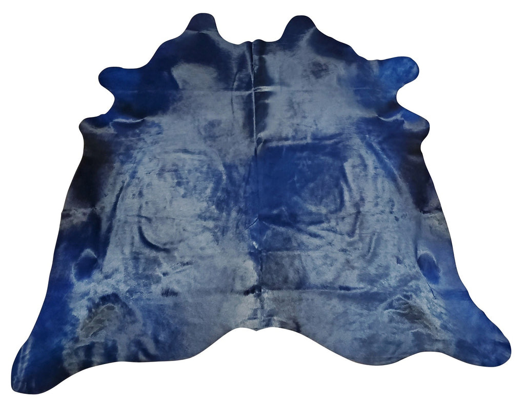 A large dyed blue cowhide rug selected for a stunning shine, soft touch and hundred percent real cowhide perfect for any interior.