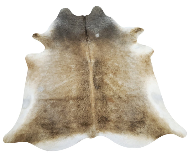 One of its kind beige tan cowhide rug with a stunning shine and softness, perfect natural pattern for any space, lays flat, no odor and free shipping