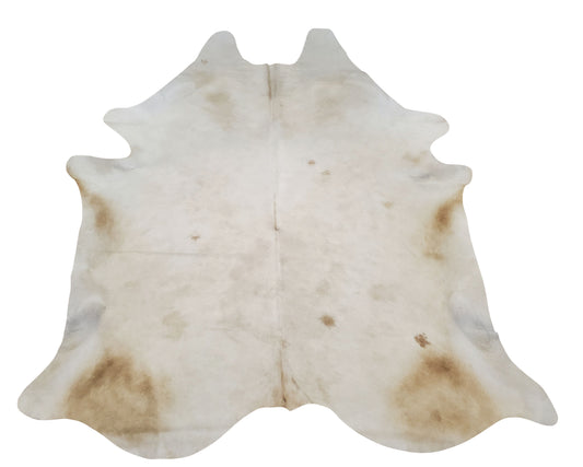 Give your wooden floor the perfect finishing touch with a stunning cowhide rug. Soft and smooth, it's sure to add an elegant touch to any home.