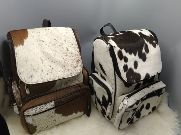 If you are fussy about cowhide bags you will adore this one, made from real cow fur, this purse will make you happy when you will see it and free shipping