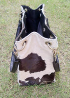 cowhide shoulder bags are stylish and practical, making them the perfect accessory for any outfit.