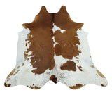 A brown cowhide rug is the perfect addition to any room. It adds a touch of elegance and sophistication, while also providing a warm and inviting feel. 