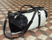 Travel in elegance with this cowhide travel bag, designed for the discerning explorer in you.