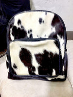 This cow skin back pack is can be use this both for work fits Macpbook perfectly along with other items, this is a quality bag that will last you a very long time.