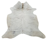 A beautiful large brindle cowhide rug perfect addition to any new home.