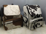 You will receive cowhide travel bag finished with very sturdy material and roomy enough, you can use it from travel as purse or shopping tote