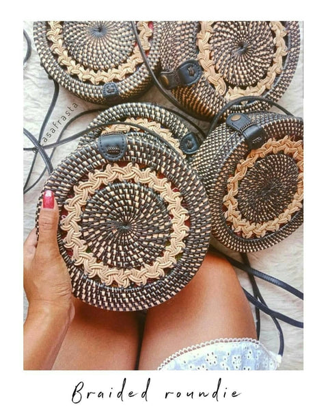 Elevate your style with our exquisite braided round rattan bag from Bali. Embrace the natural beauty and craftsmanship of this must-have accessory.
