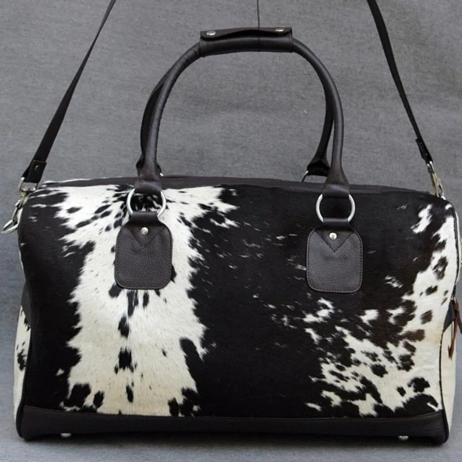 Cowhide duffle bag black white travel leather