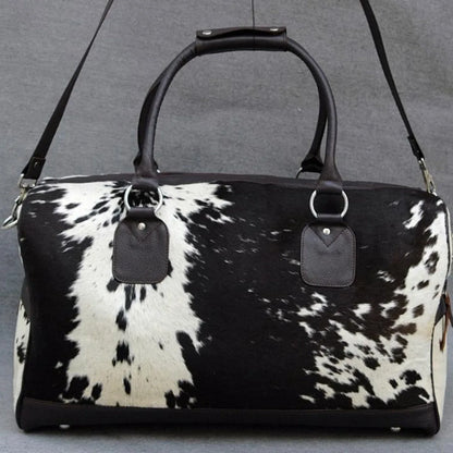 Cowhide duffle bag black white travel leather