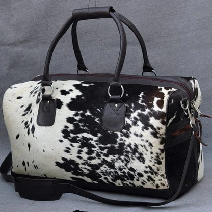 Cowhide duffle bag black white travel leather