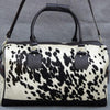 Cowhide duffle bag black white travel leather