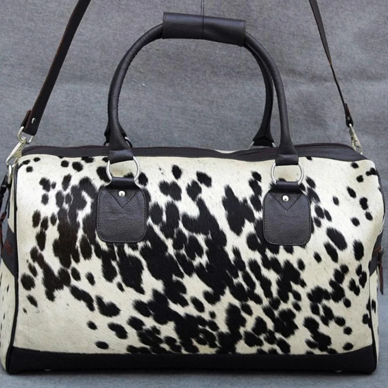 Cowhide duffle bag black white travel leather