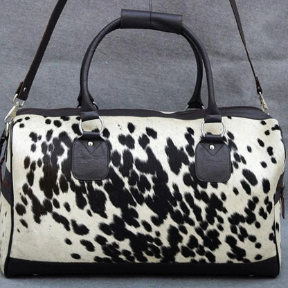 Cowhide duffle bag black white travel leather