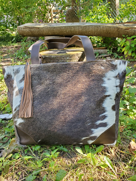 A messenger bag made from real cowhide for western style 