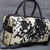 Cowhide duffle bag black white travel leather