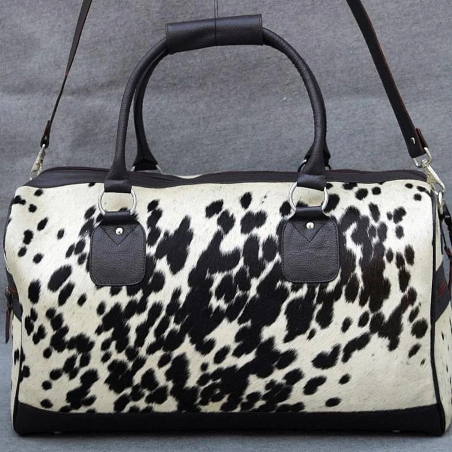 Cowhide duffle bag black white travel leather