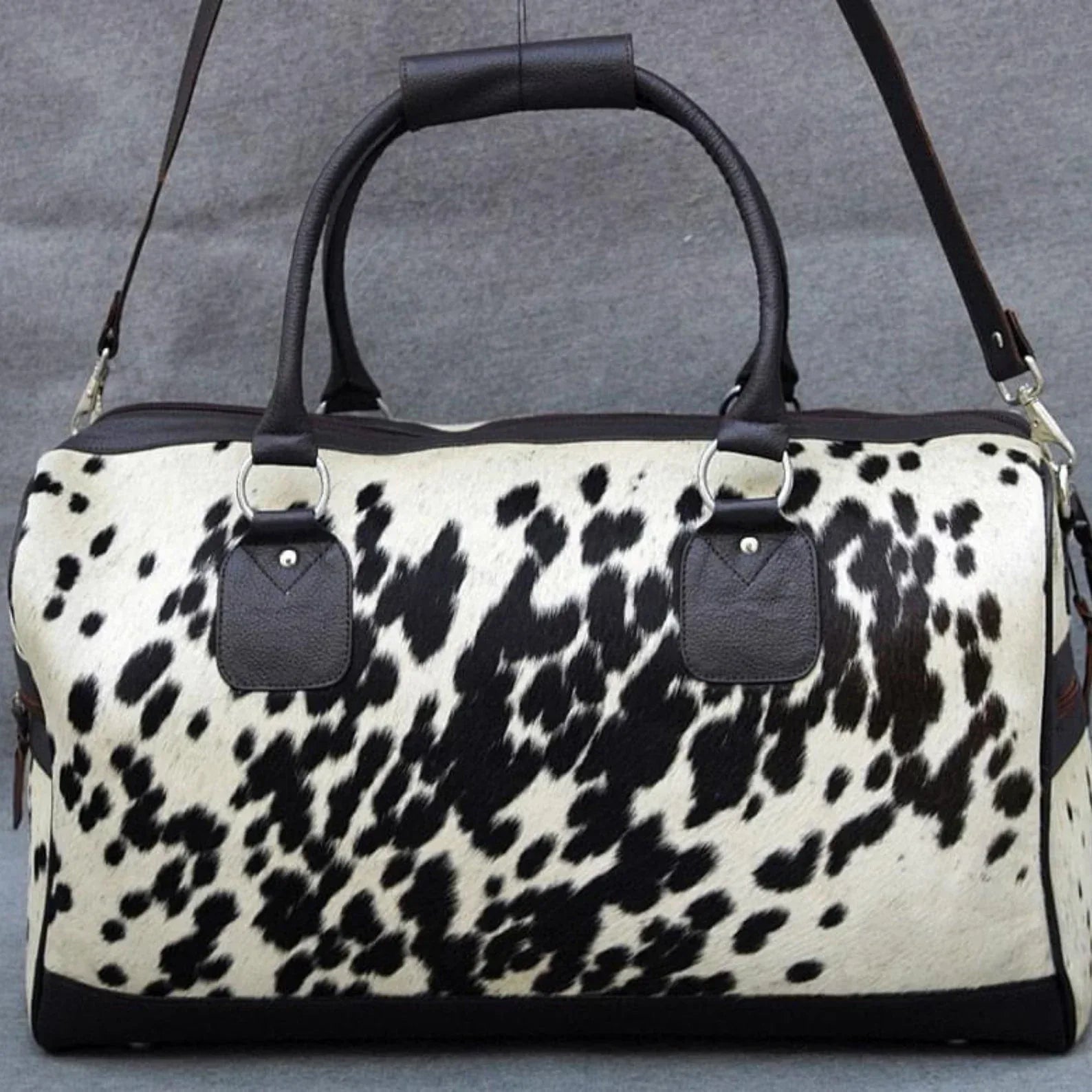 Cowhide duffle bag black white travel leather