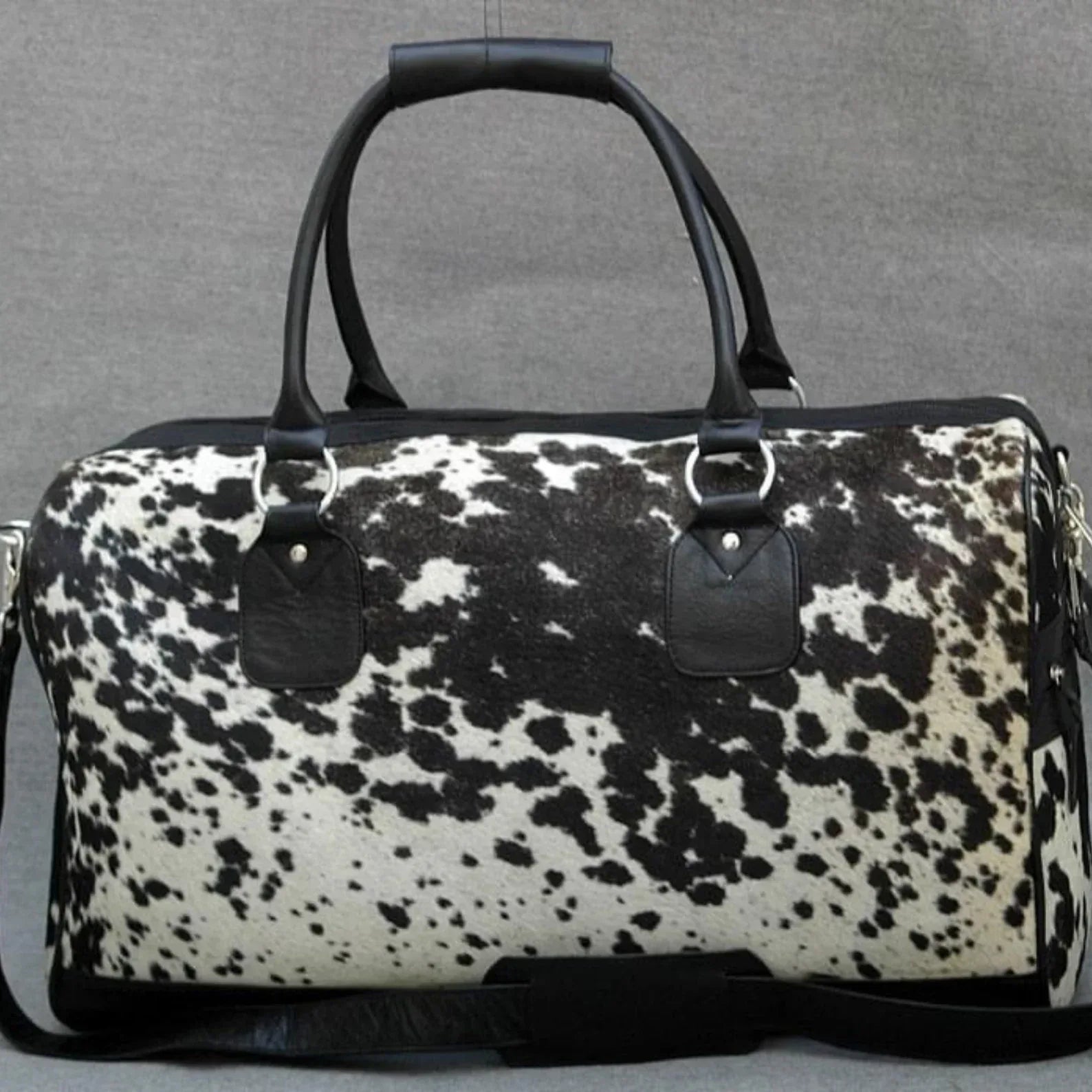 Cowhide duffle bag black white travel leather