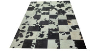 black cowhide patchwork rug