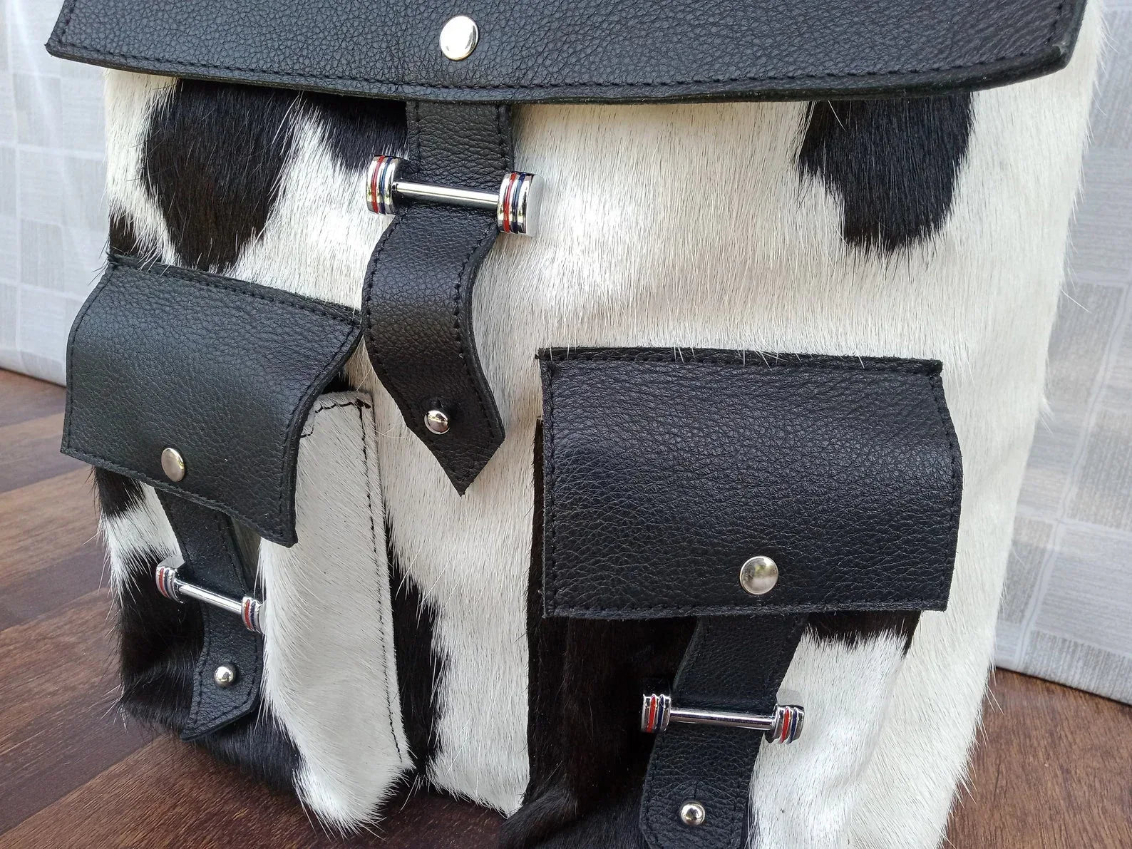 Black leather cowhide backpack with hair on hide