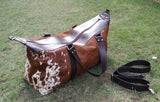 A gorgeous brown black white DIY cowhide side bag for western styling this cowhide travel luggage style bag is perfect handbag for weekend gym. 