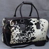 Cowhide duffle bag black white travel leather