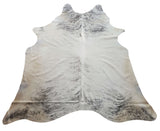 A grey brindle cowhide area rug can greatly enhance your living room, providing beauty with a touch of western style. 