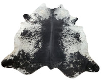 A vibrant and trendy cowhide rug for regardless of style tastes, whether it be contemporary, trendy, or farmhouse, in large speckled black and white is perfect for any space and situation. 