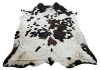 A choice of tricolor cowhide rugs is a sensible choice for individuals who wish to design a cozy, homey space for use.