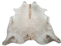 This beige palomino cowhide is beautiful and exotic, it is very high quality, perfect size and looks just like the picture. A super beautiful cowhide rug, it is super cute, soft and there is no need for any anti-slip pad.