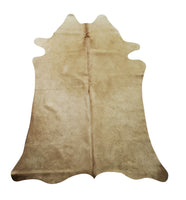 This extra small cowhide rug offers a great pop of color, a stunning mix of beige and some light brown, if you have hardwood floors this is just the perfect piece your room needs. 