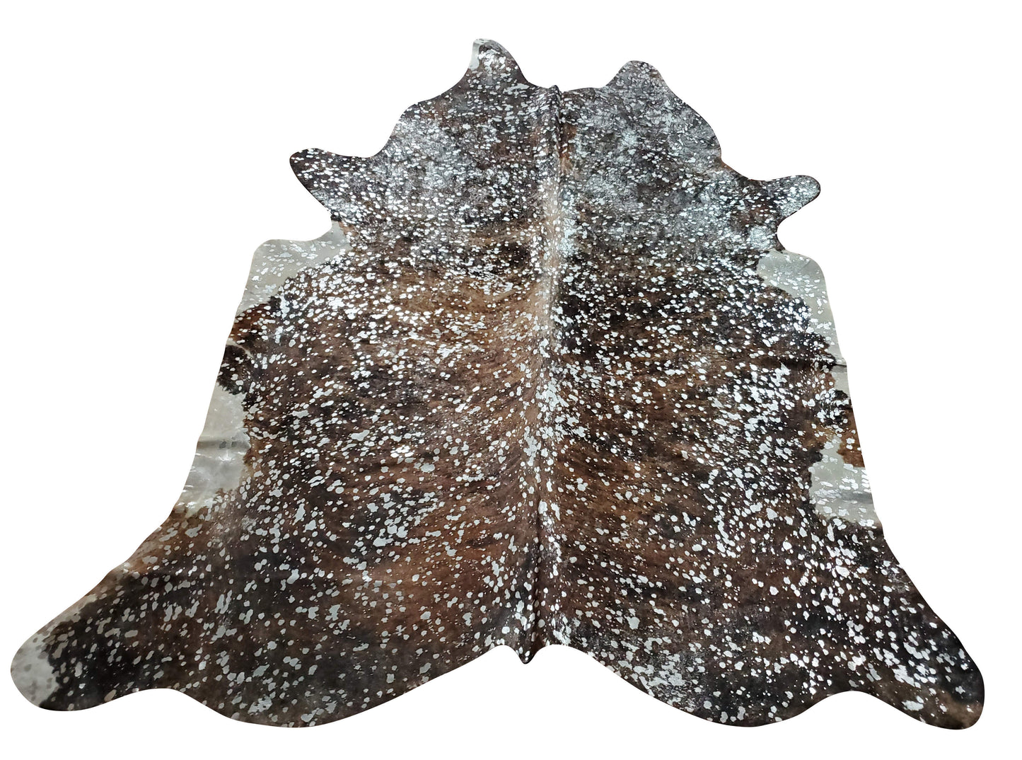 This attractive metallic cowhide rug is stunningly beautiful, and it even looks more beautiful in person; you'll be captivated by the intricate silver design. It's very soft and cozy, too plus free shipping all over the USA