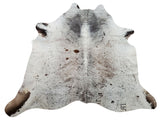 This cowhide rug is perfect for any room or space. It's natural, spotted, and perfect for high traffic areas. Plus, it's great for upholstery!