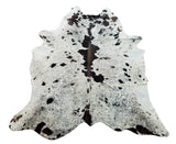 A stunning salt pepper pattern cowhide rug for your entry way or home office, each cowhide is selected for exotic markings.
