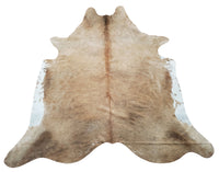 This light beige brown cowhide rug will bring all the compliments that your interior has been awaiting, it is natural and selected for a unique style.