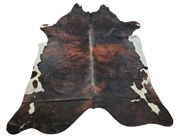 This dark cowhide rug is perfect for adding a rustic touch to your home. The natural brown and black colors will complement any décor.