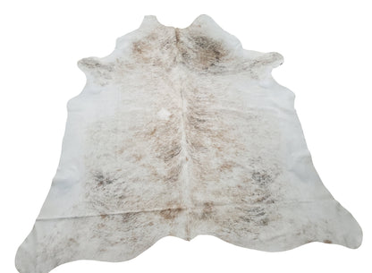 This is a lovely brindle cowhide rug, it will make any heart jump when you will look at it, this natural cowhide is delicious, subtle, natural and strong earthy colors. 