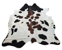 This gorgeous tricolor cowhide rug fits into a rustic country kitchen perfectly. Both natural and chemical-free, pets adore it.