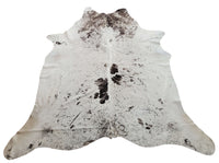 A new and large grey white speckled cowhide rug touch of nature to your modern home and it will look beautiful in a kitchen