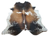 brown and white cowhide rugs are ideal for living rooms or bedrooms, while smaller rugs can be used in entryways or bathrooms.